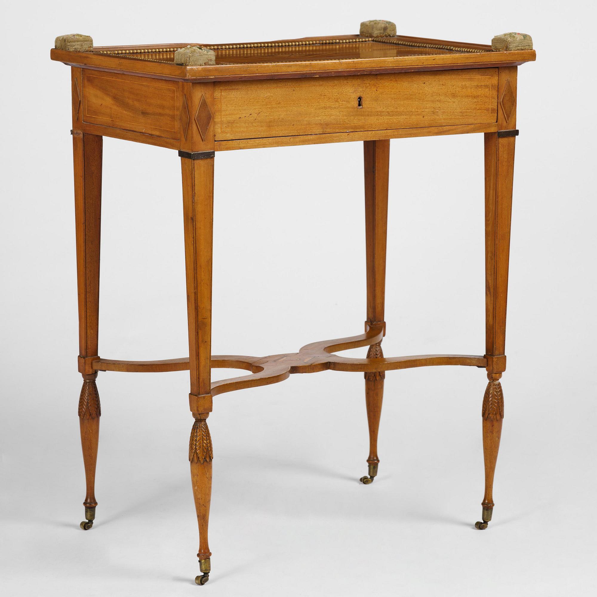 A late Gustavian mahogany table attributed to L. Qvarnberg (master in Stockholm 1801-13).