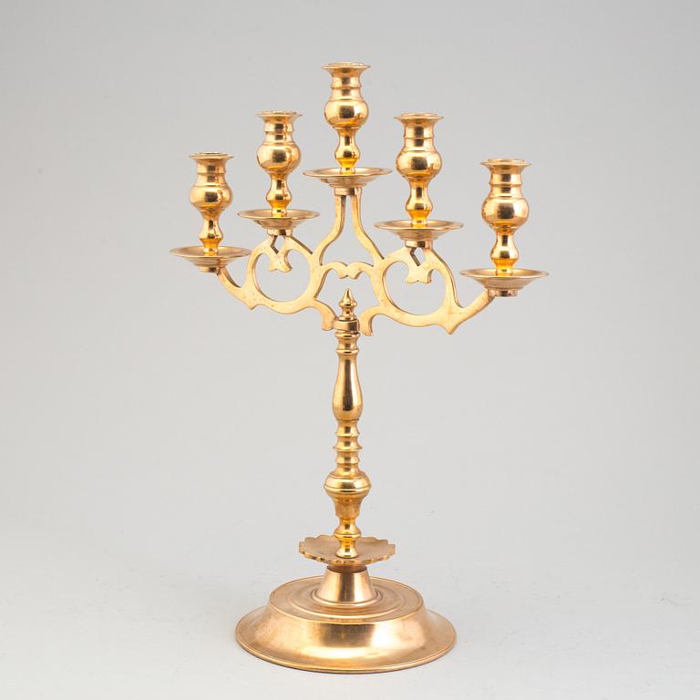 A pair of brass baroque style candelabra, early 20th century.