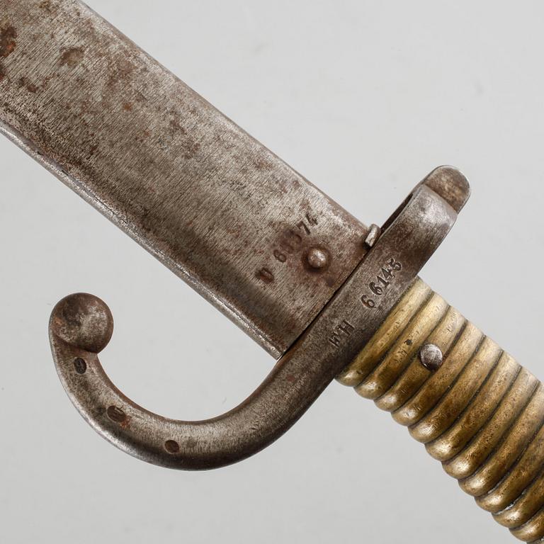 A french bayonet, dated 1875.