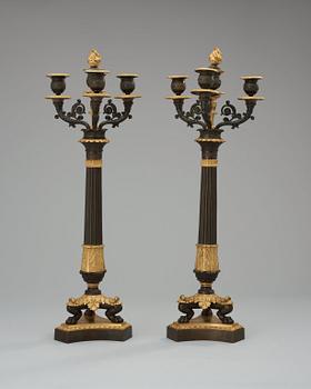A pair of French Empire 19th century four-light candelabra.