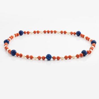 Necklace with coral, cultured pearls, and likely lapis lazuli.