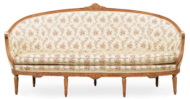 A Louis XVI 18th century sofa. Two later armchairs included.