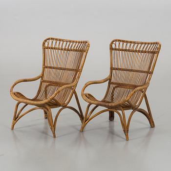 A pair of ratten armchairs. Sika-Design.