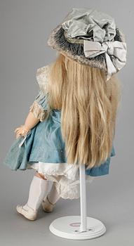 A German/French bisquit doll, marked DEP, around 1900.