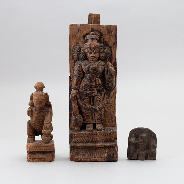 Three carved wooden and stone sculptures / decorative elements, India, presumably 19th century.