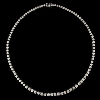 1277. A brilliant cut diamond necklace, tot. app. 15 cts.