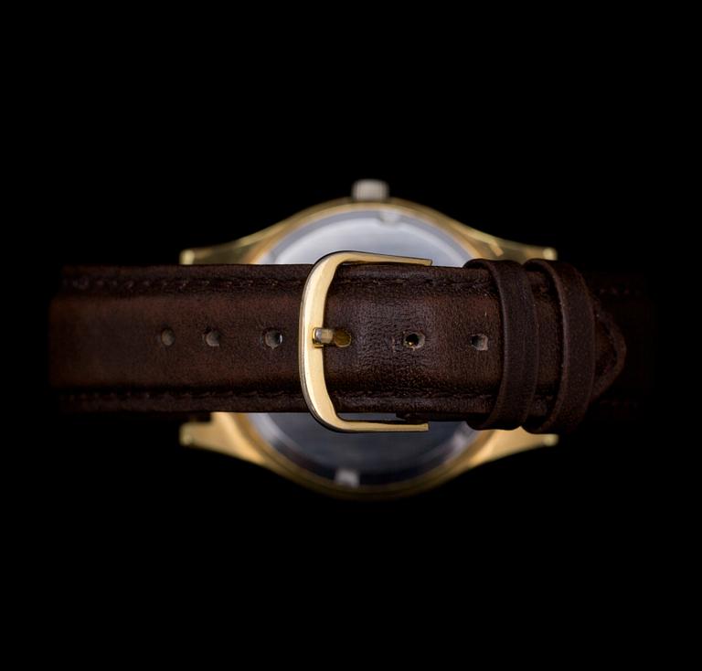 ARMBANDSUR, guld på stål. Omega "Genéva".