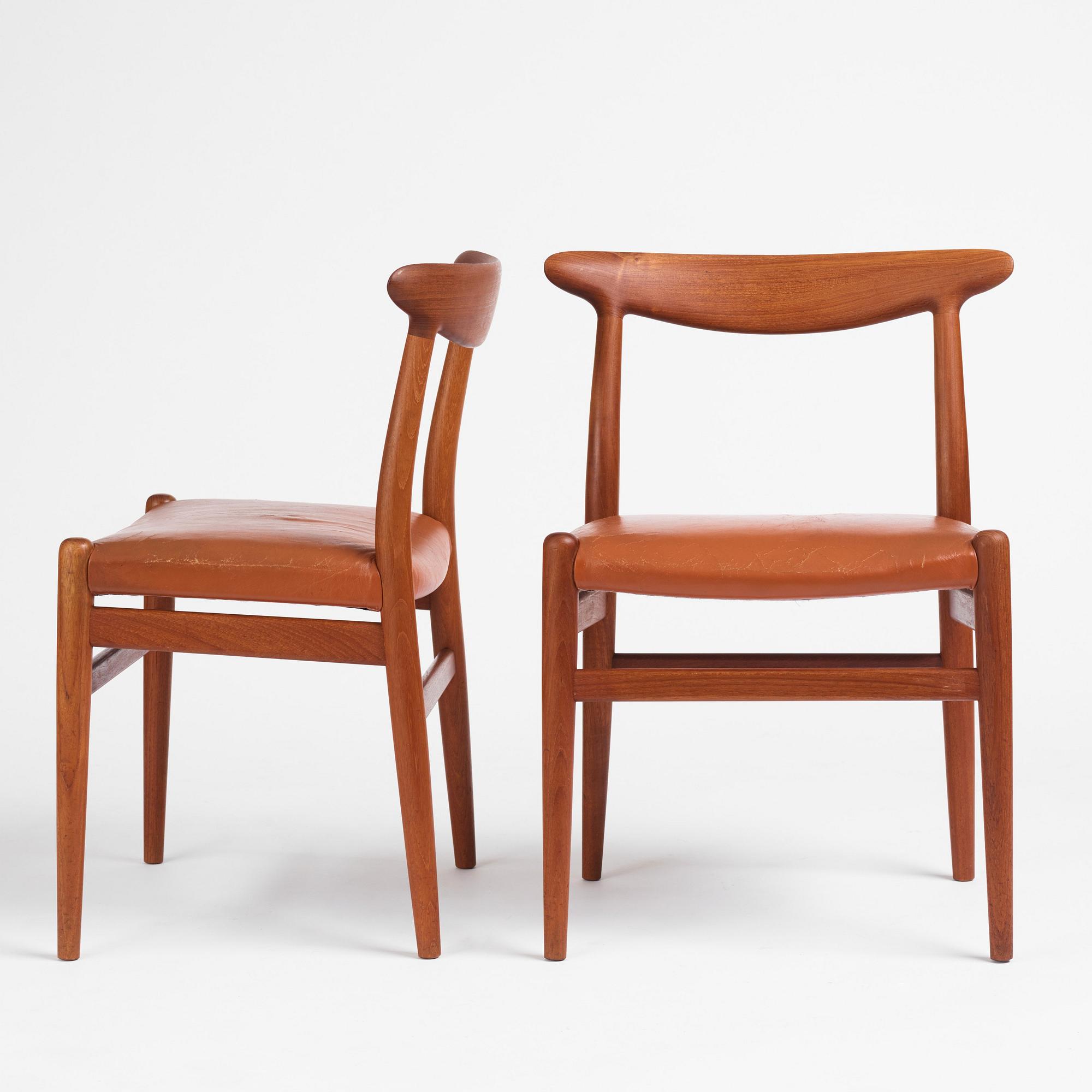 Hans J. Wegner, a set of eight teak chairs model "W2", C.M. Madsens Fabriker, Denmark 1950s.