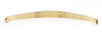 ARMBAND, guld 18K, sju små diamanter, stämplad CB, Europa 1900-talets andra hälft. Vikt ca 40 gram.