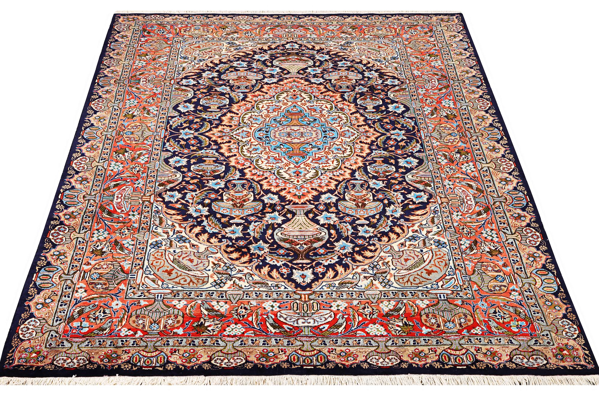 A Kashmar carpet, c. 310 x 203 cm.