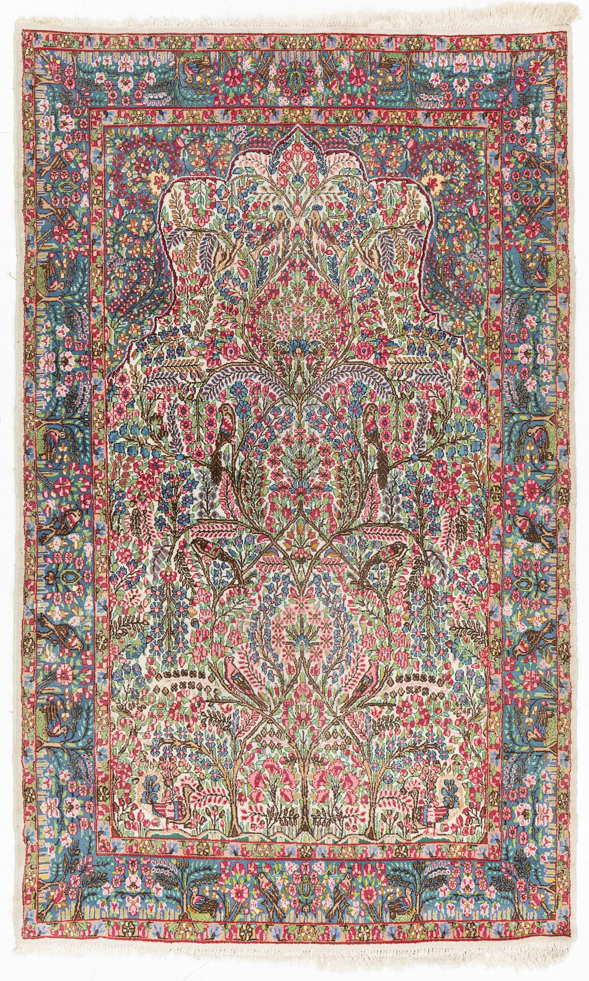 A semi-antique 'Millefleur' Kerman, ca ca 245 x 148 cm.