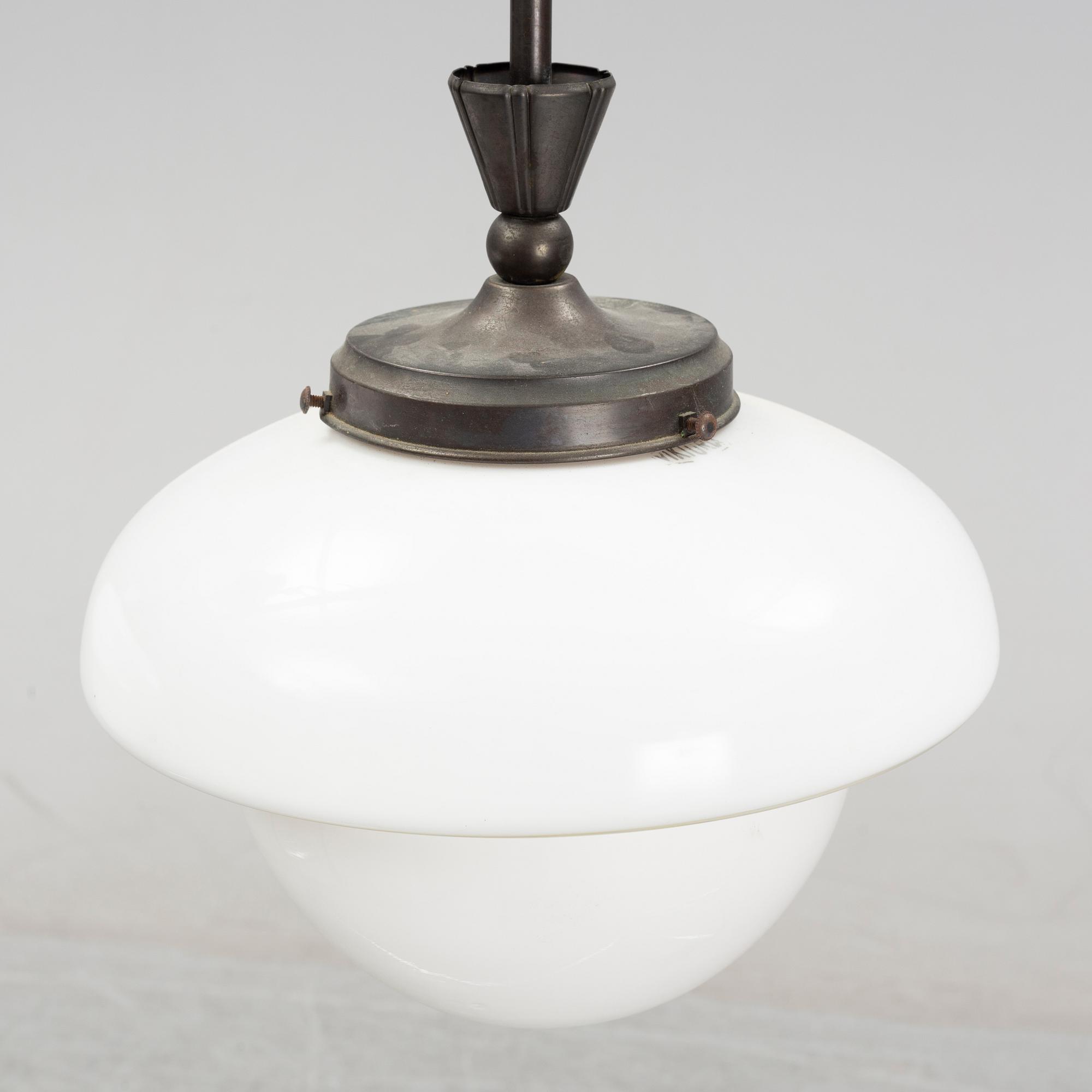 A pair of glass and patinated brass ceiling lights, Asea, 1930's.