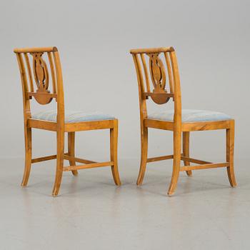 A set of 8 first half of the 20th century chairs veneered with birch.