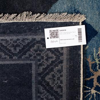 A rug, semi-antique Baotou figural, China, ca 174 x 93 cm.