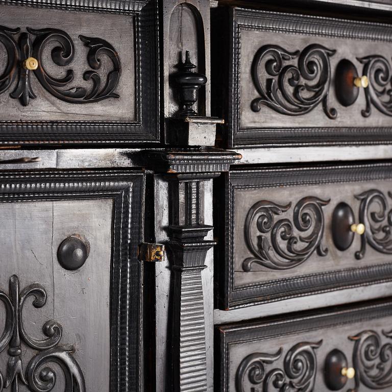 A South-German Baroque ebonized collector's cabinet on stand, circa 1700.