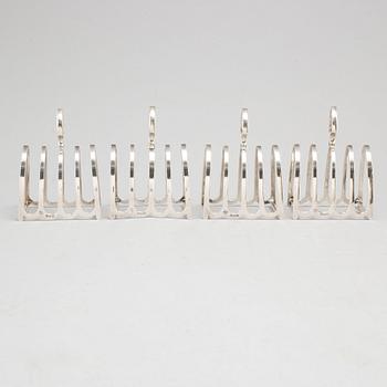 a set of four silver toastracks, Barker Brothers Birmingham 1936.