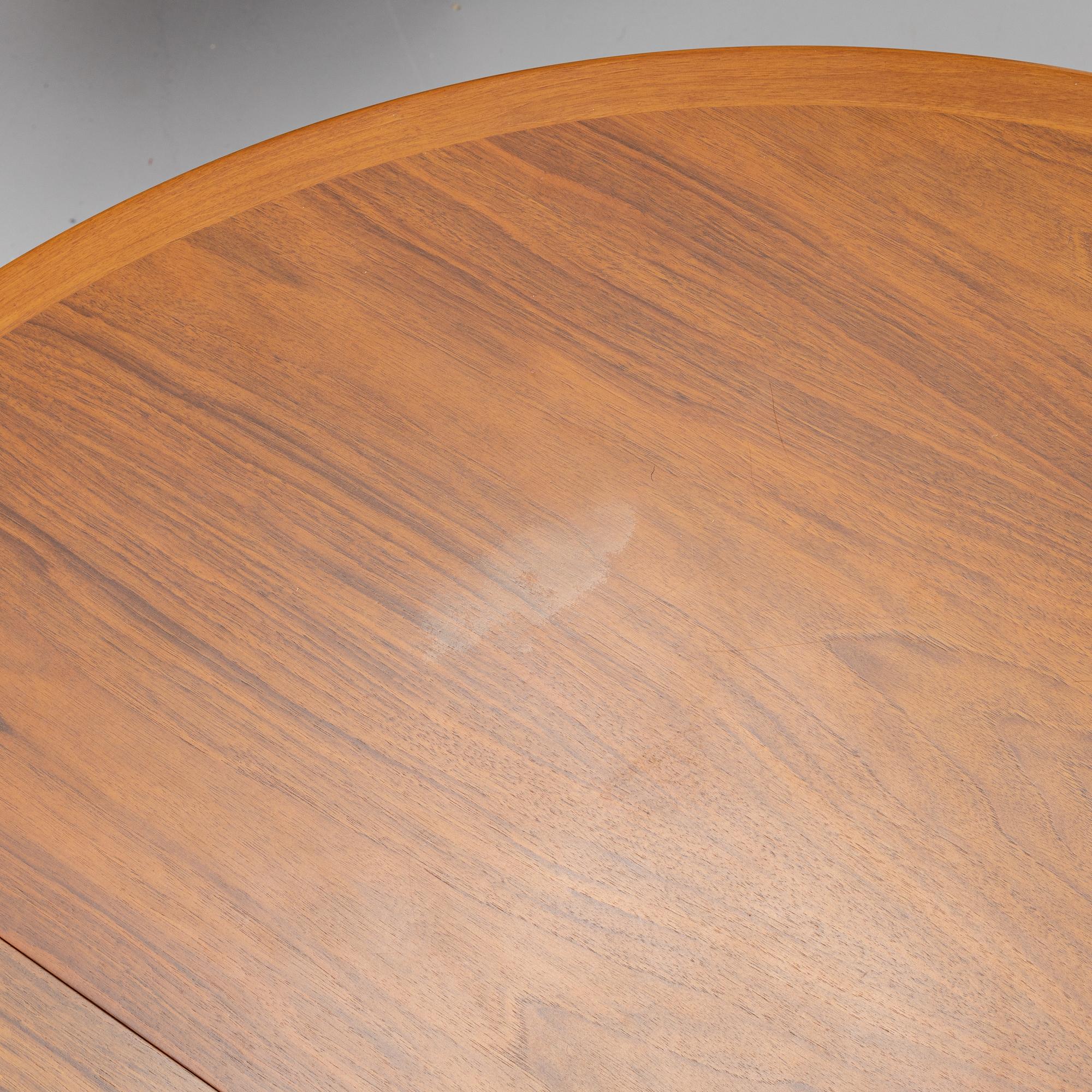 A walnut dining table by Bertil Fridhagen, Bodafors, 1960's.