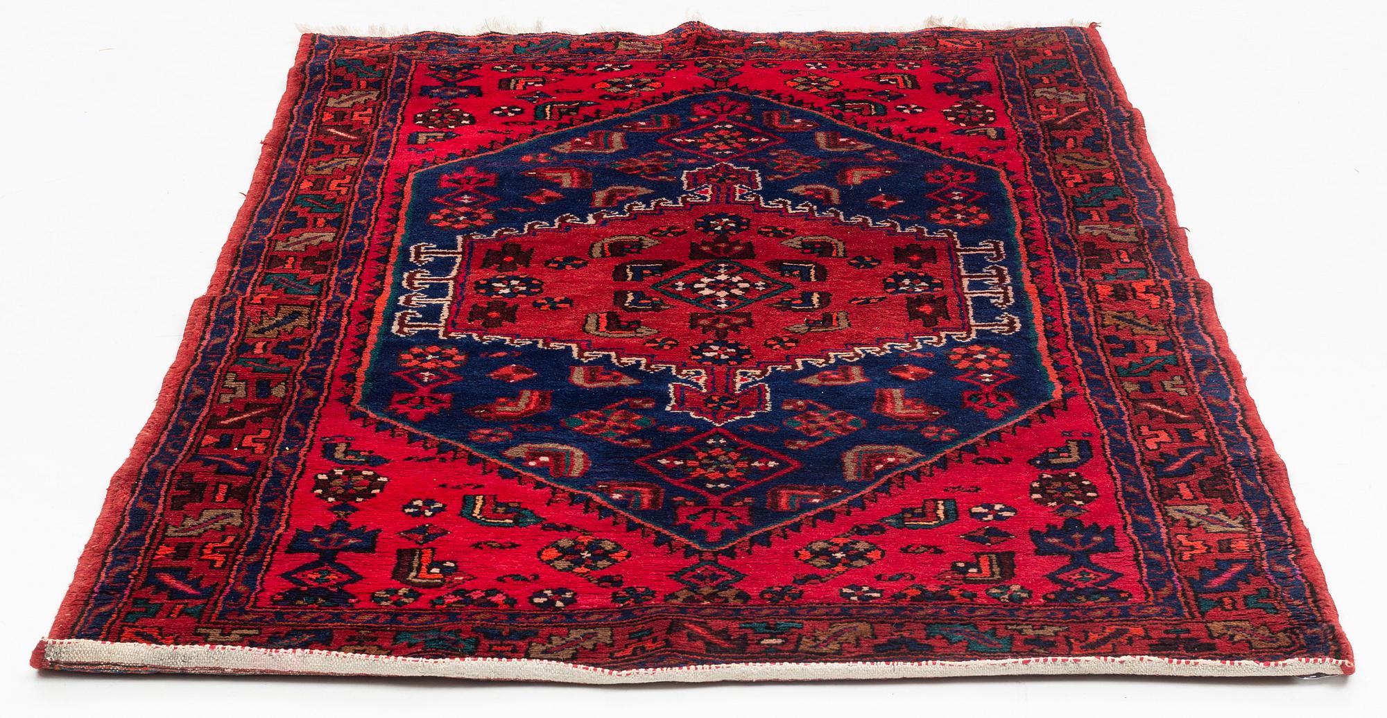 A carpet, circa 201 x 134 cm.