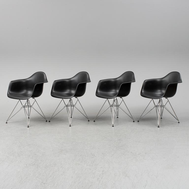 CHARLES AND RAY EAMES,  4  Eames Plastic Armchair, Vitra 2010.