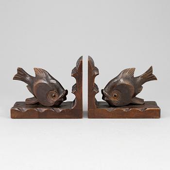 A pair of dark wood book ends, first half of the 20th century.