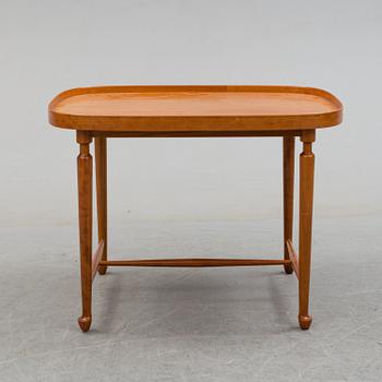 A model 974 mahogany table by Josef Frank, Svenskt Tenn, 1940's/50's.