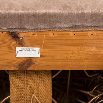 A mid-20th-century pair of armchairs.