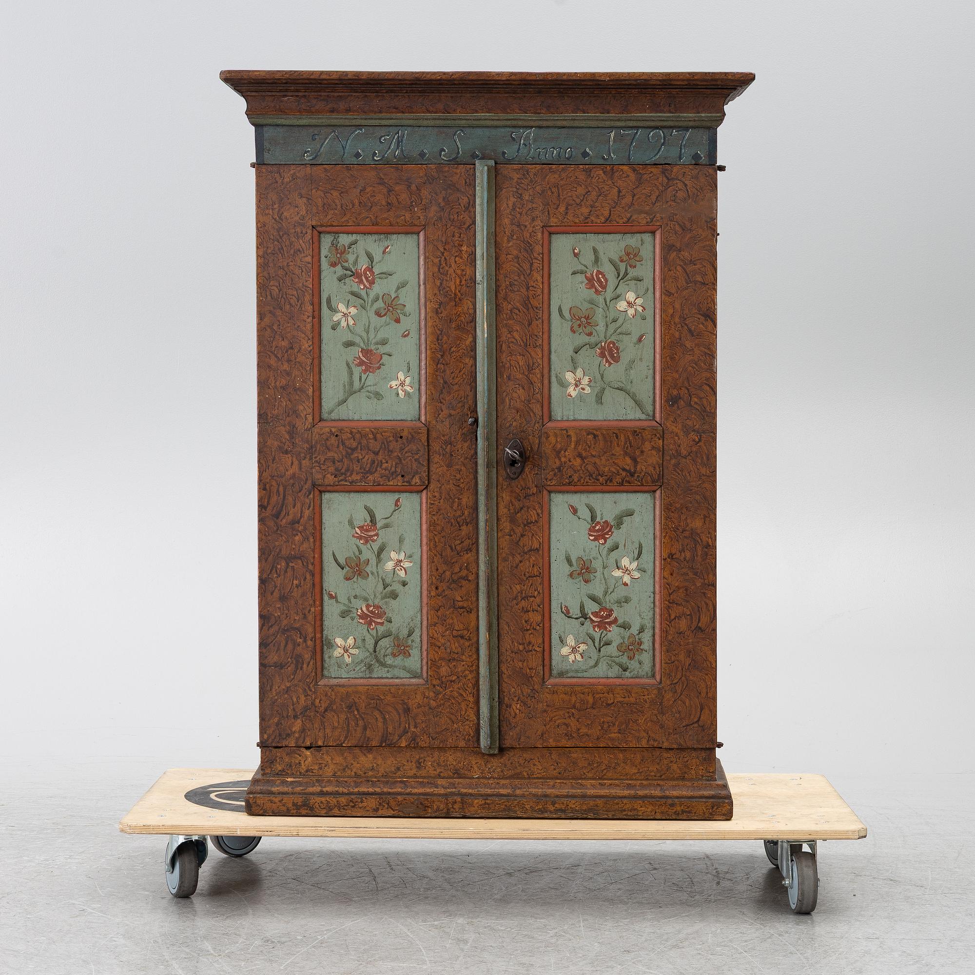 A Swedish painted cabinet,  marked 1797.