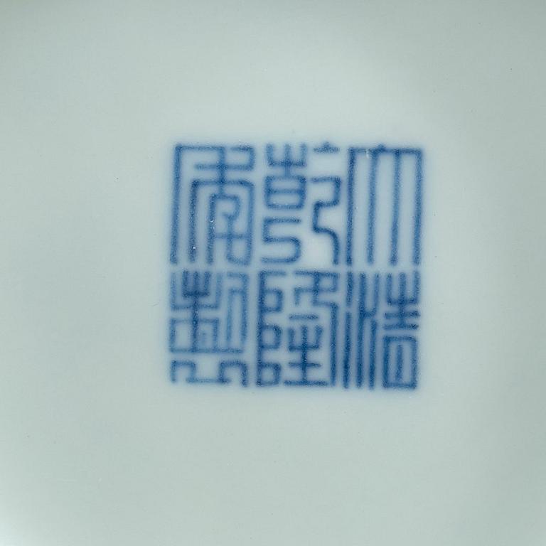 A pair of blue and white five clawed dragon bowls, Qing dynasty with Qianlong's sealmark and period (1736-95).