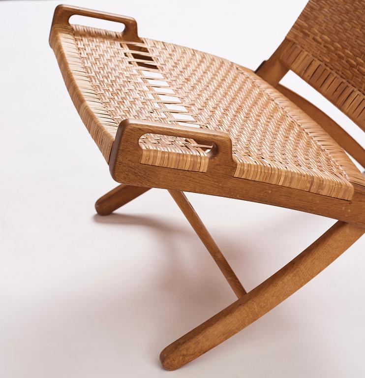 Hans J. Wegner, a pair of oak and rattan folding chairs 'JH-512', Johannes Hansen, Denmark 1950-60s.