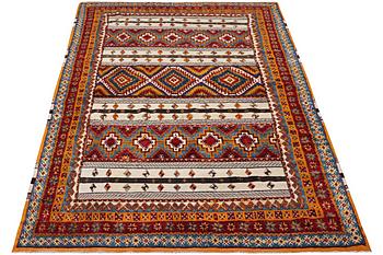 A Moroccan carpet, c. 318 x 193 cm.