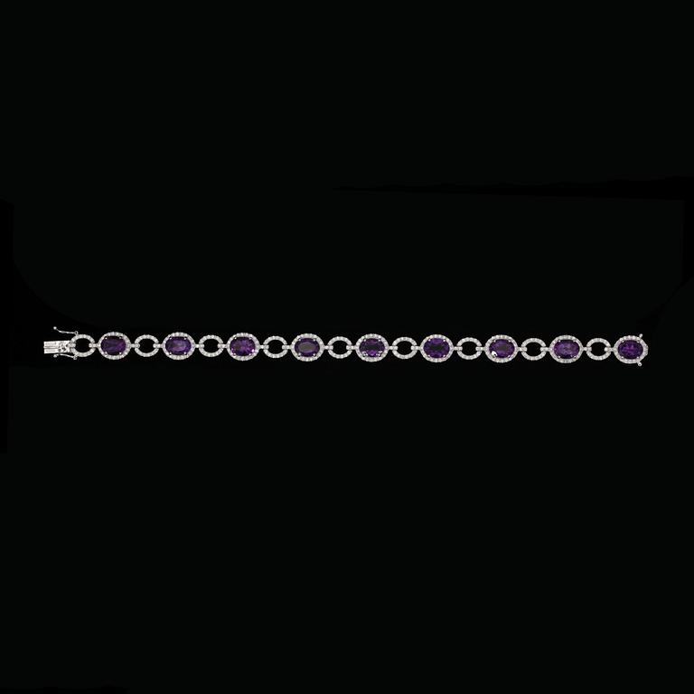 An amethyst bracelet, 10.53 cts with brilliant cut diamonds, tot. 2.07 cts.