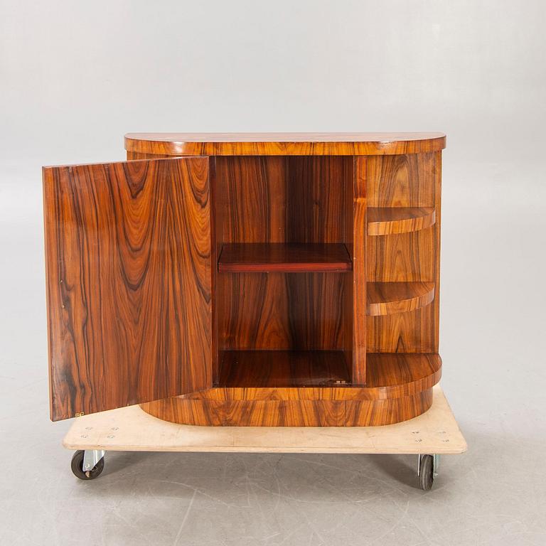 An Art Deco walnut sideboard first half of the 20th century.