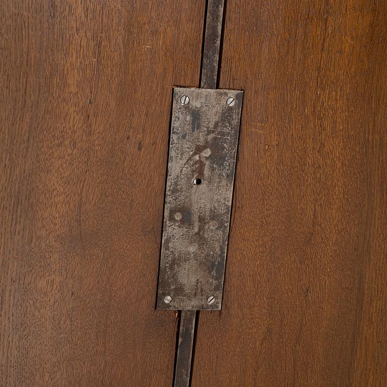 A pair of mahogany veneered empire style cabinets.