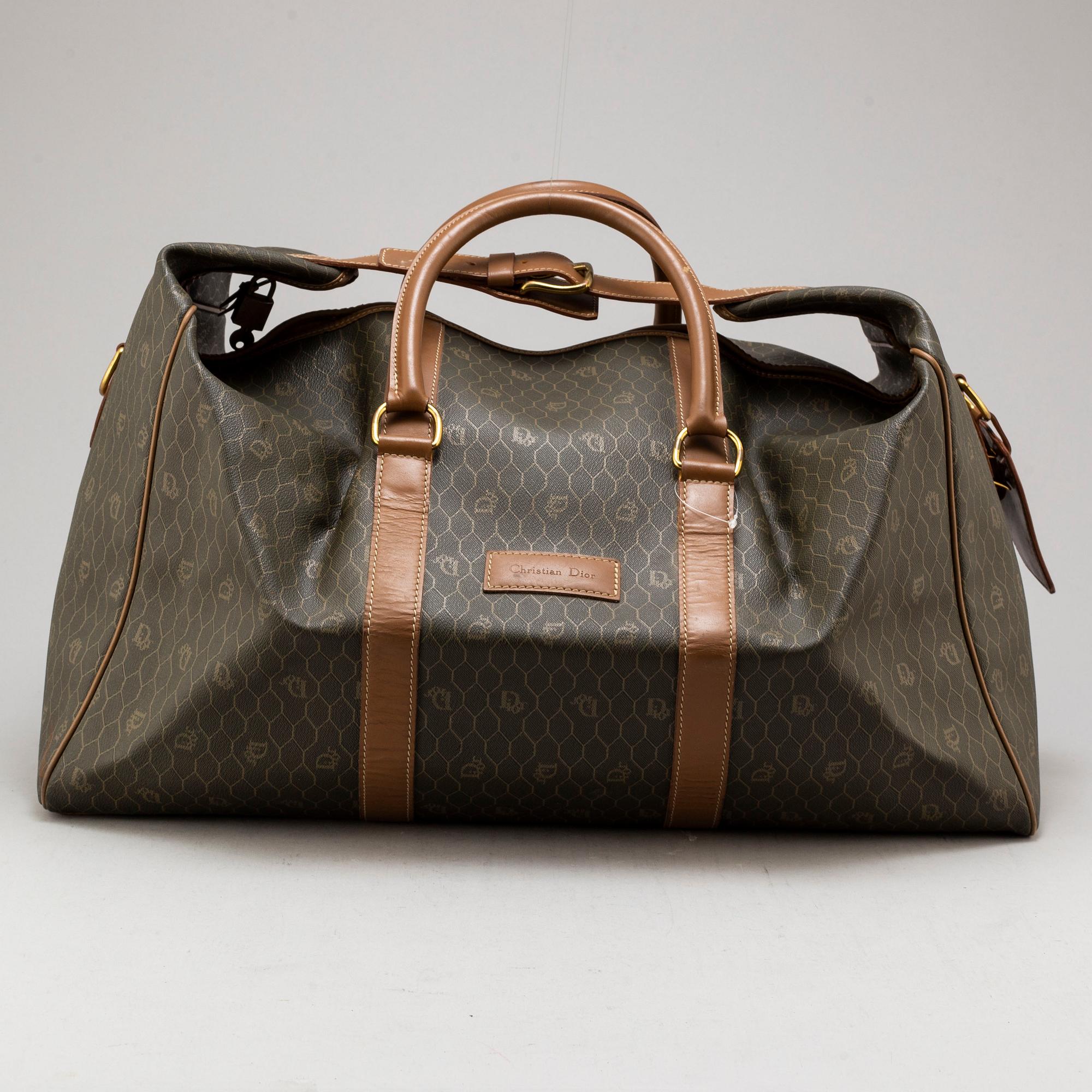 CHRISTIAN DIOR, a canvas and leather weekendbag.