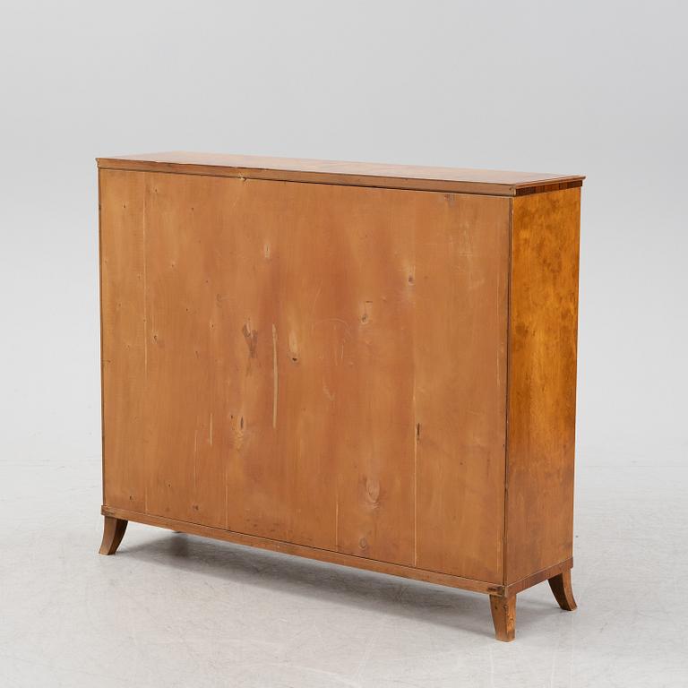 A birch and rosewood veneered bookcase, 1940's.