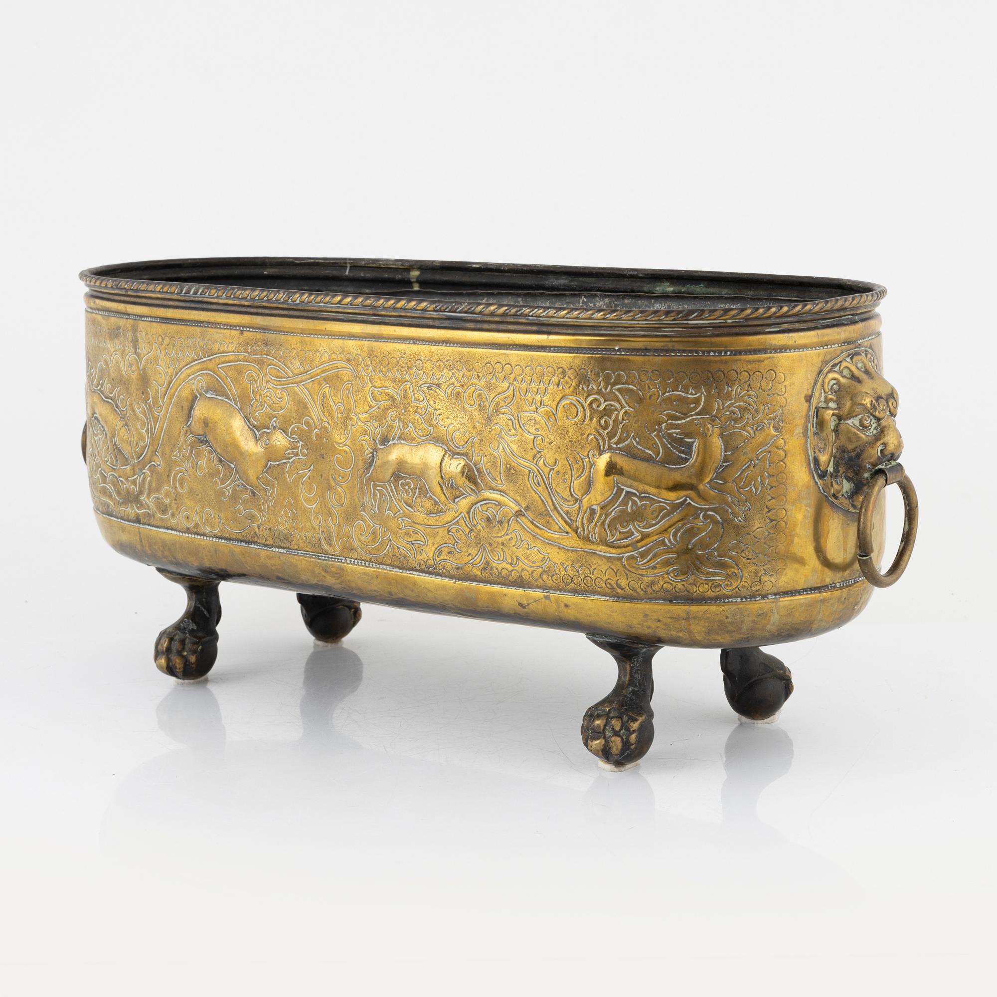 A 19th century brass jardinière.