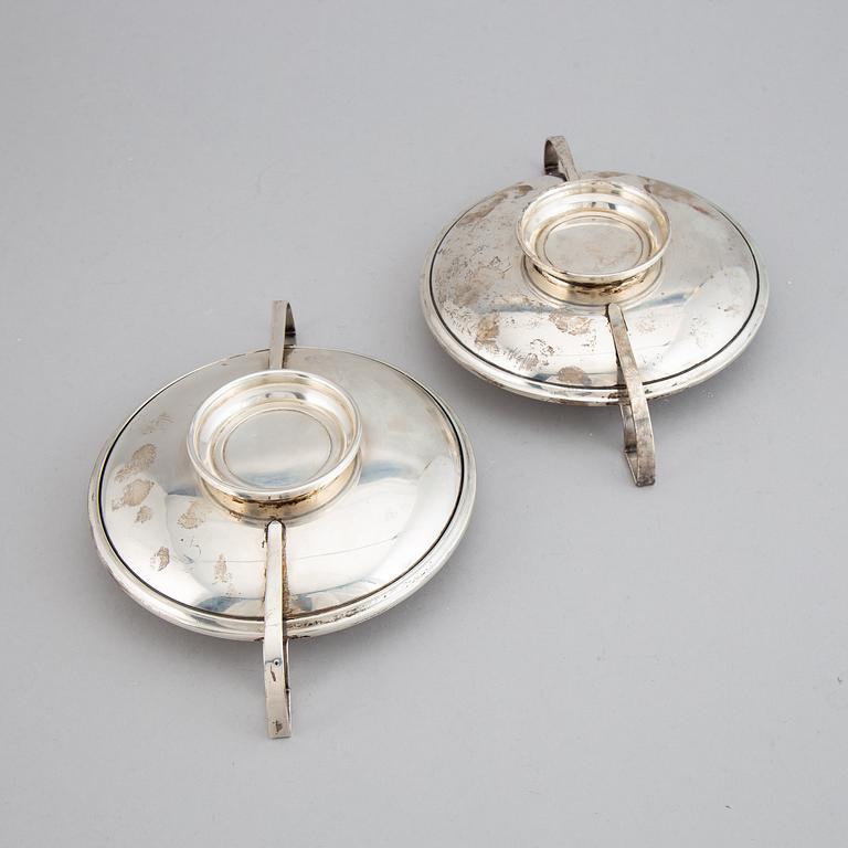 A pair of sterling silver tazzaz.