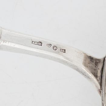 A Swedish Silver Ladle, mark of Adolf Öström, Piteå 1887 and a pair of Silver Candlesticks.