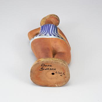 LISA LARSON, A stoneware  figurine from Gustavsberg.