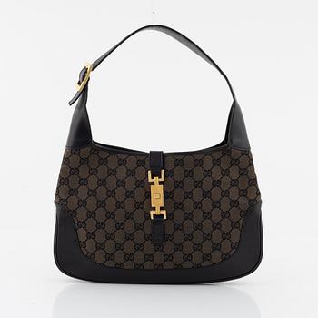 Gucci, A monogram canvas and leather 'Jackie O' bag.