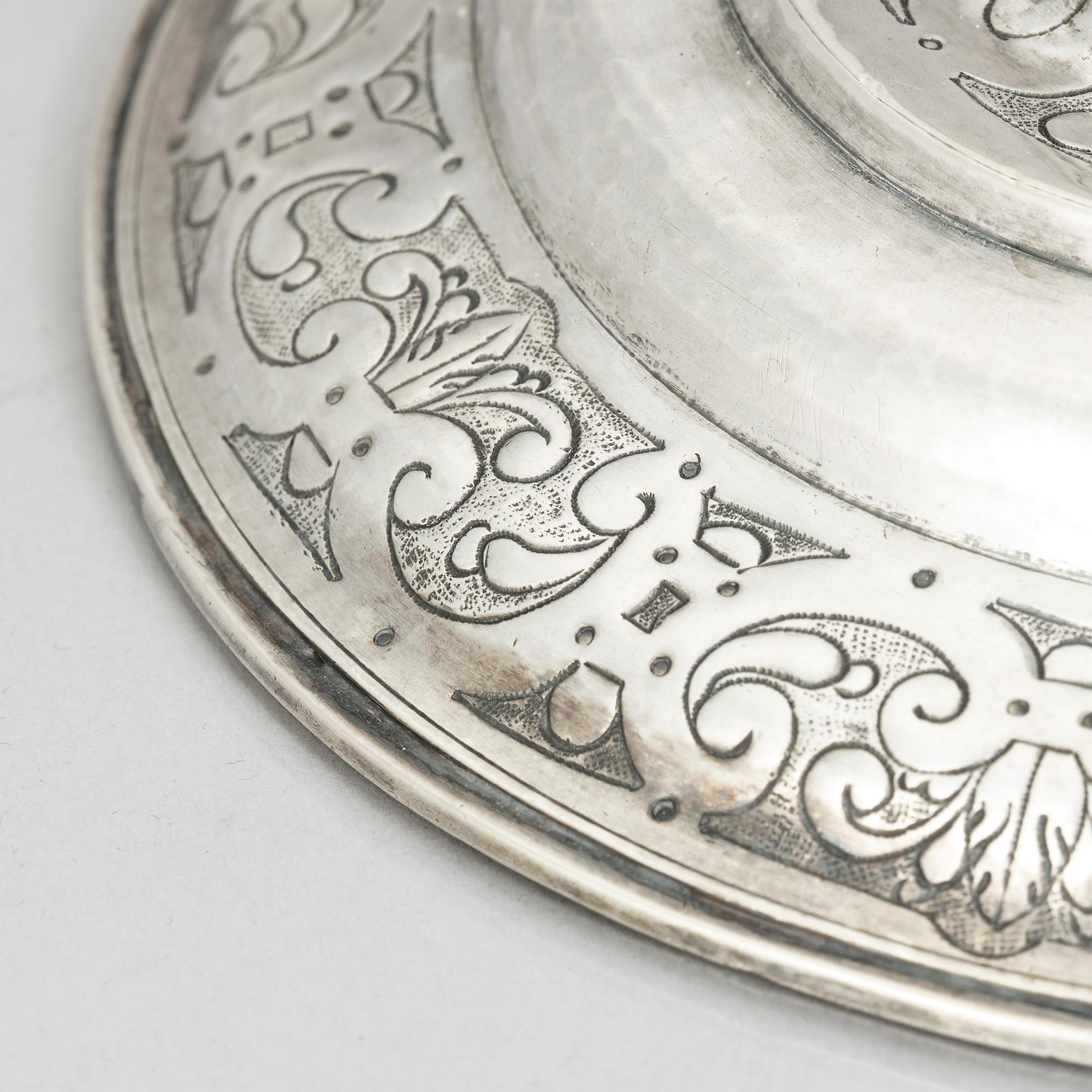 An 18th century parcel-gilt silver cup and paten, unmarked.