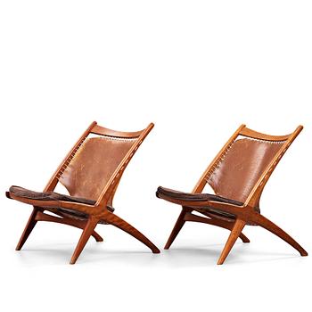 346. Fredrik Kayser, Rastad & Relling Tegnekontor, a pair of teak and leather "The Cross Chair", produced by Gustav Bahus, Norway 1950's.