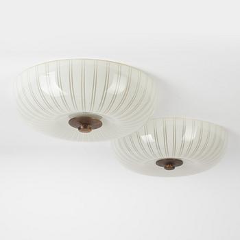 A pair of Swedish Modern ceiling lamps, 1940's.