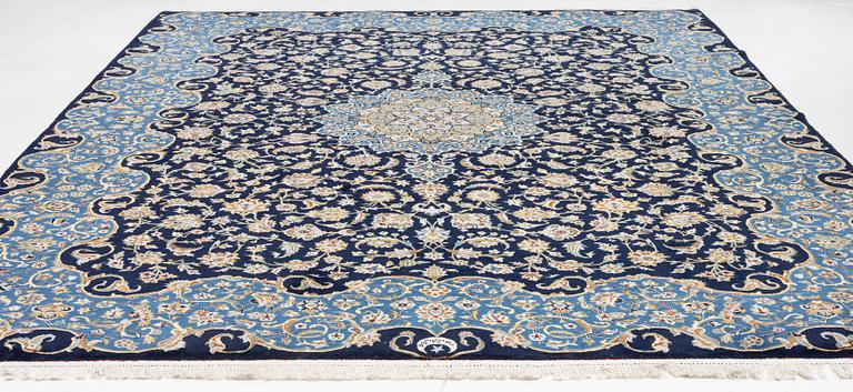 A Royal Keshan carpet, signed, c. 395 x 295 cm.