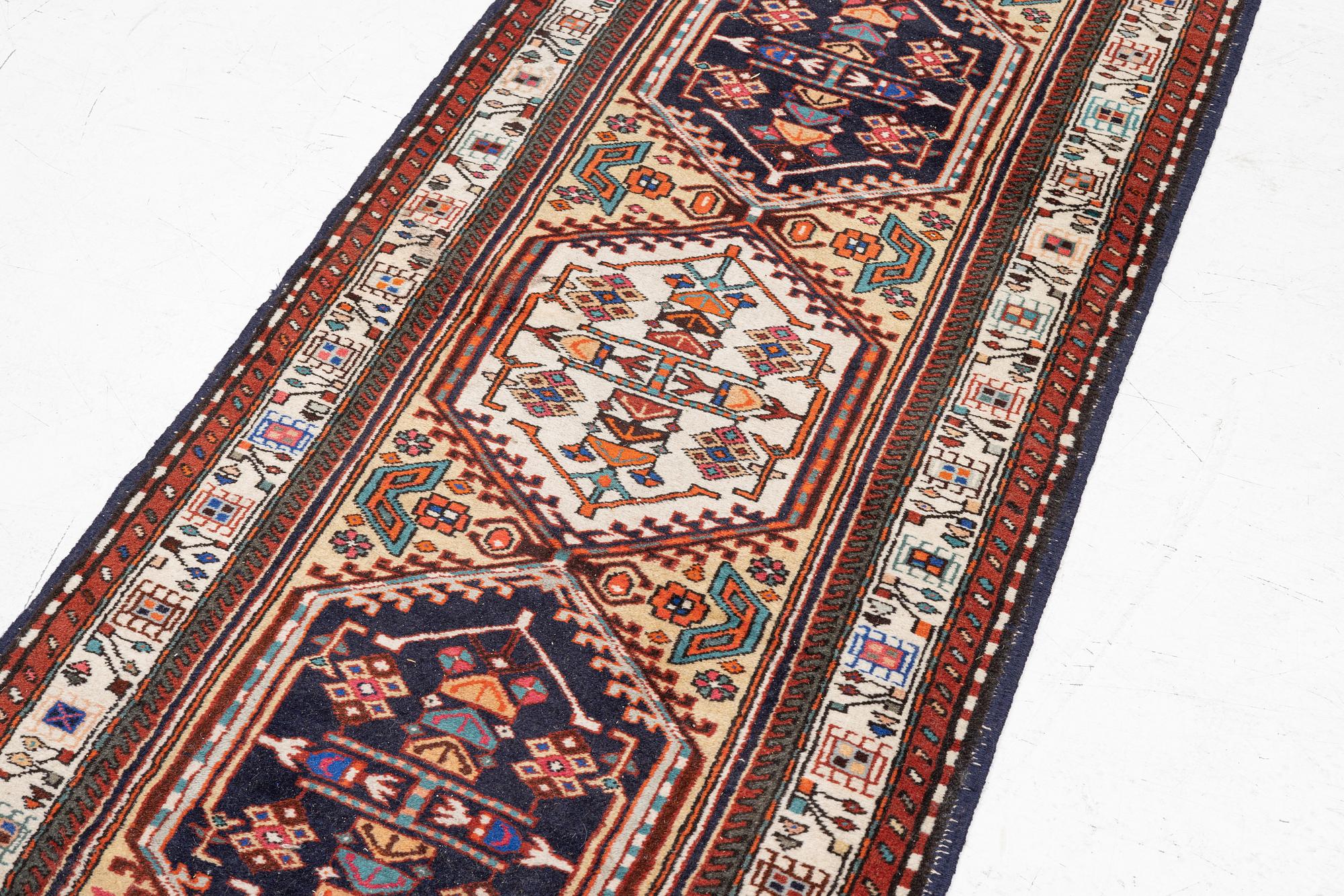 A Sarab gallery carpet, approx. 299 x 78 cm.