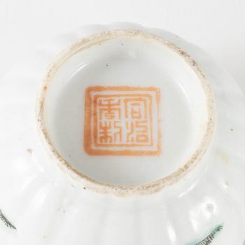 A powder blue and famille verte jar and two famille rose cups, Qing dynasty, 19th Century.