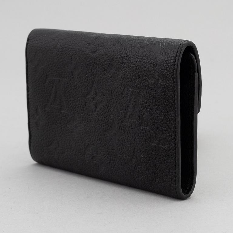 Louis Vuitton, a black Monogram Empreinte leather 'Curieuse' wallet, 2015.