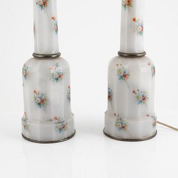 A pair of kerosene lamps, around 1900.