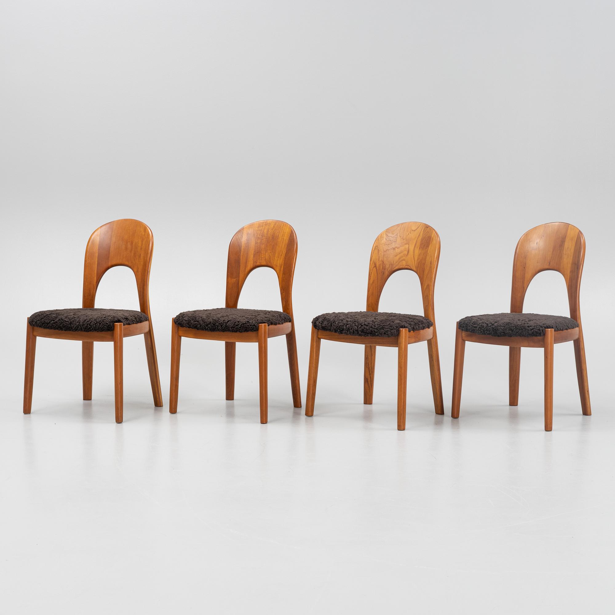Niels Koefoed, eight teak dining chairs upholstered in new sheep skin, Denmark, 1960's.