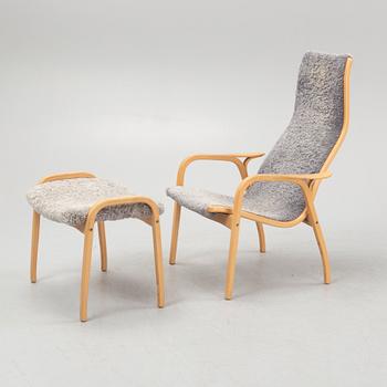 Yngve Ekström, a 'Lamino' armchair with a foot stool, Swedese.